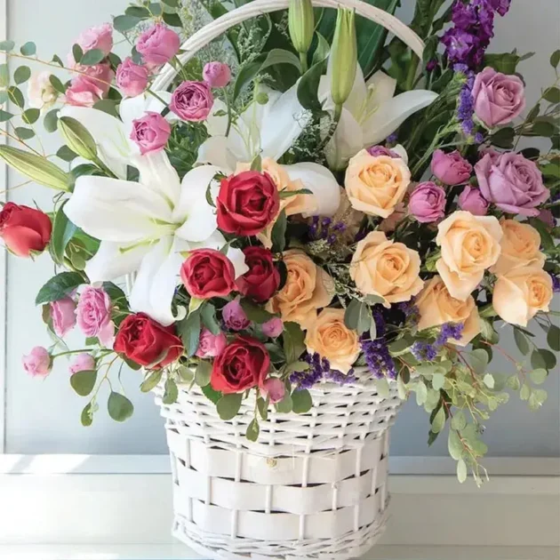 Mixed flowers in bucket - Image 2
